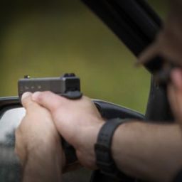 Trtium sights on a gun in action