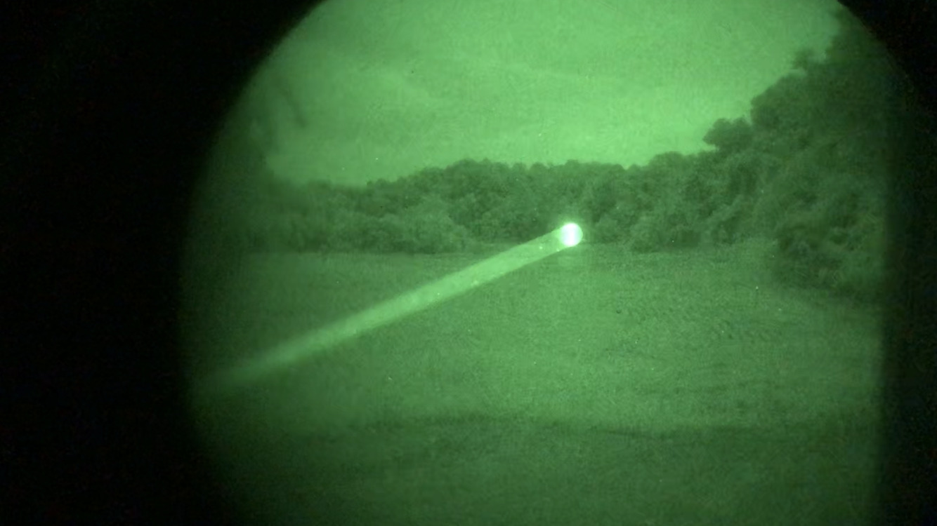 Betalight B20 Green Laser Pointer pointing in the distance