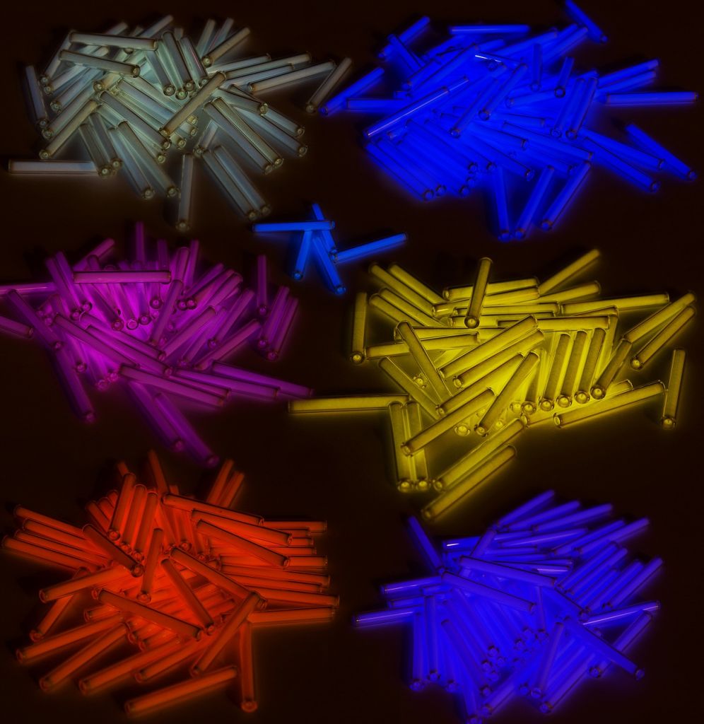 6 colors of tritium vials lighting up together in the dark