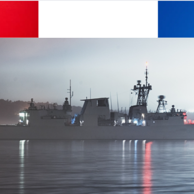 Navy ship with red, white and blue lights