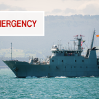 Navy ship with emergency sign
