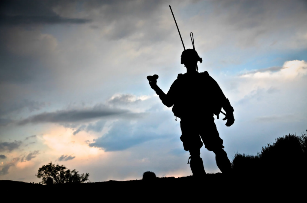 A soldier wearing a communication backpack