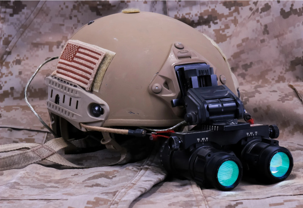 Helmet with night vision goggles attached