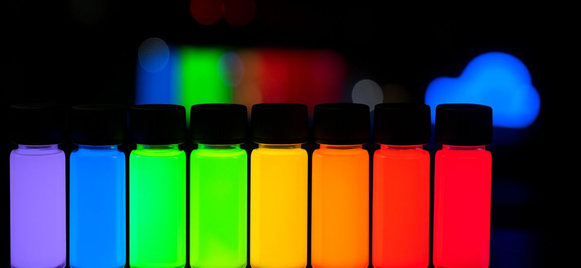 quantum dot and nanophosphor colored bottles